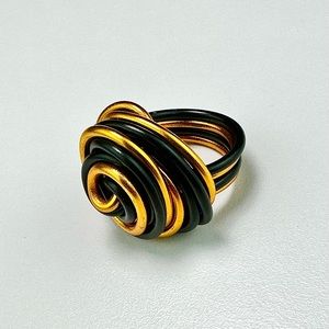 Gold and black swirl ring